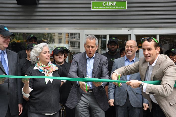 Meyer and CEO Randy Garutti cutting the ribbon.