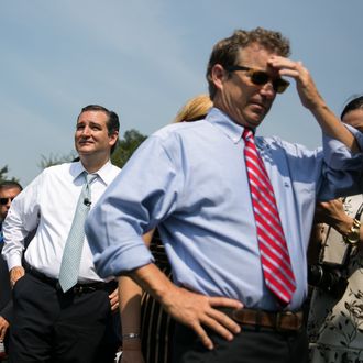 WASHINGTON, DC - SEPTEMBER 10: U.S. Sen. Ted Cruz (R-TX) (L) and U.S. Sen. Rand Paul (R-KY) arrive for the 