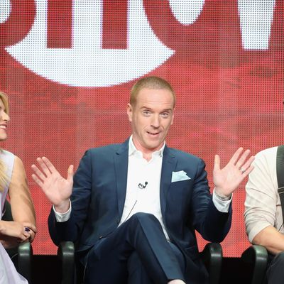 BEVERLY HILLS, CA - JULY 29: (L-R) Actors Claire Danes, Damian Lewis and Rupert Friend speak onstage during the 