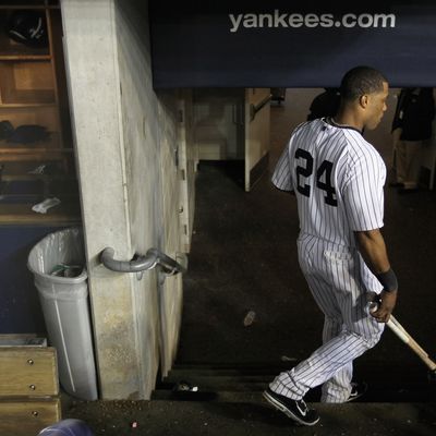 NEW YORK, NY - OCTOBER 06: Robinson Cano #24 of the New York Yankees walks out of the dugout dejected towards the clubhouse after they lost 3-2 agaisnt the Detroit Tigers during Game Five of the American League Championship Series at Yankee Stadium on October 6, 2011 in the Bronx borough of New York City. (Photo by Nick Laham/Getty Images)