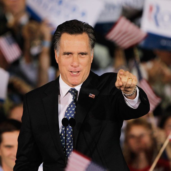 TAMPA, FL - JANUARY 31: Republican presidential candidate, former Massachusetts Gov. Mitt Romney gestures during his Florida primary night party on January 31, 2012 in Tampa, Florida. According to early results Romney defeated former Speaker of the House Newt Gingrich, former U.S. Sen. Rick Santorum and U.S. Rep. Ron Paul (R-TX) to win Florida's primary. (Photo by Joe Raedle/Getty Images)