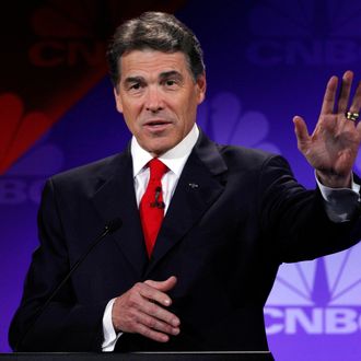 Republican presidential candidate Texas Gov. Rick Perry speaks during a Republican Presidential Debate at Oakland University in Auburn Hills, Mich., Wednesday, Nov. 9, 2011. (AP Photo/Paul Sancya)