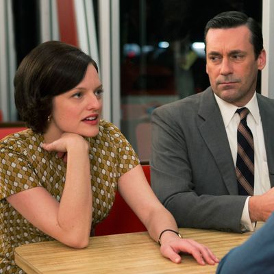 Elisabeth Moss as Peggy Olson, Jon Hamm as Don Draper and Vincent Kartheiser as Pete Campbell - Mad Men _ Season 7, Episode 6 - Photo Credit; Justina Mintz/AMC