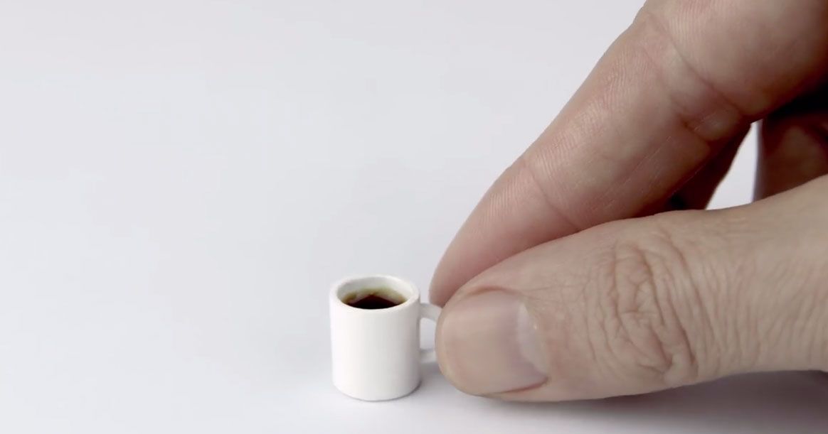 The world's smallest espresso cup looks absolutely ridiculous in my hands.  😂😂😂