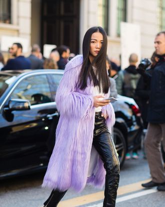 white fur coat ysl purple bag black heels white pants outf…