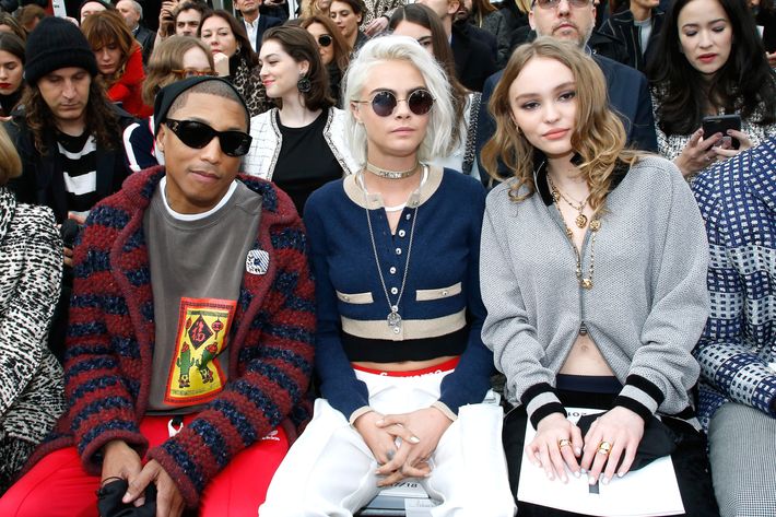 Pharrell Williams walks in the Chanel show in Paris