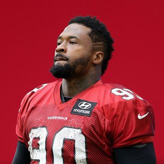GLENDALE, AZ - JULY 26: Defensive tackle Darnell Dockett #90 of the Arizona Cardinals arrives to practice during the team training camp at University of Phoenix Stadium on July 26, 2013 in Glendale, Arizona. (Photo by Christian Petersen/Getty Images) *** Local Caption *** Darnell Dockett