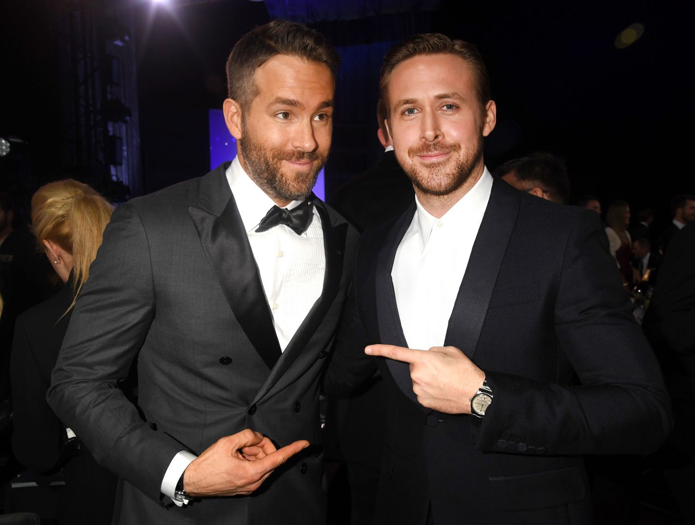 Several Photos of Ryan Gosling and Ryan Reynolds Pointing at Each Other.