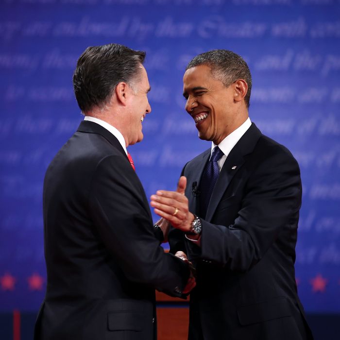 DENVER, CO - OCTOBER 03: Democratic presidential candidate, U.S. President Barack Obama (R) shakes hands with Republican presidential candidate, former Massachusetts Gov. Mitt Romney (L) during the Presidential Debate at the University of Denver on October 3, 2012 in Denver, Colorado. The first of four debates for the 2012 Election, three Presidential and one Vice Presidential, is moderated by PBS's Jim Lehrer and focuses on domestic issues: the economy, health care, and the role of government. (Photo by Chip Somodevilla/Getty Images)