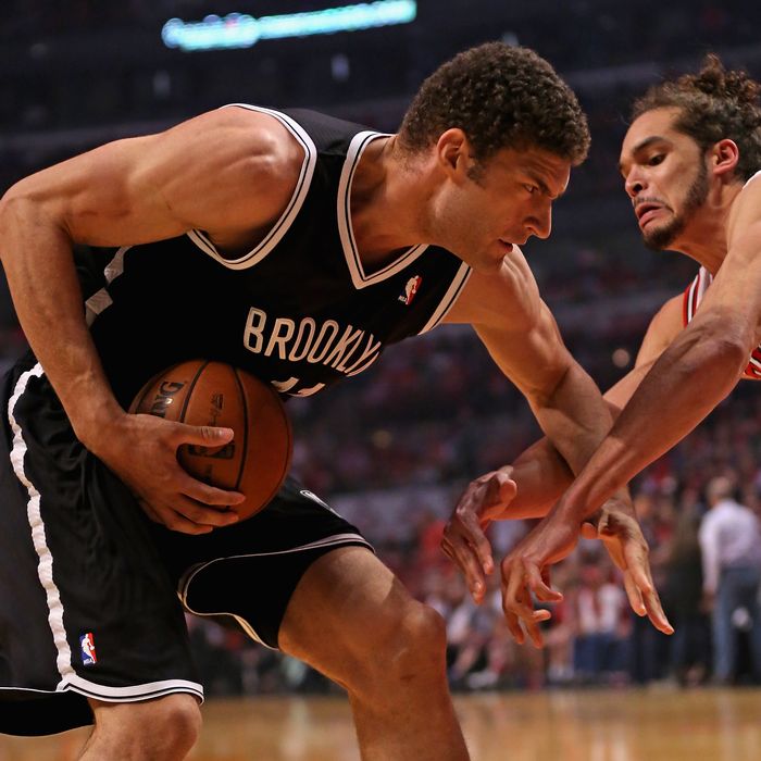 CHICAGO, IL - APRIL 27: Brook Lopez #11 of the Brooklyn Nets moves against Joakim Noah #13 of the Chicago Bulls in Game Five of the Eastern Conference Quarterfinals in the 2013 NBA Playoffs at the United Center on April 27, 2013 in Chicago, Illinois. NOTE TO USER: User expressly acknowledges and agrees that, by downloading and/or using this photograph, User is consenting to the terms and conditions of the Getty Images License Agreement. (Photo by Jonathan Daniel/Getty Images) *** Local Caption *** Brook Lopez; Joakim Noah