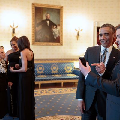President Barack Obama talks with performer Justin Timberlake in the Blue Room prior to the “In Performance at the White House: Memphis Soul” concert in the East Room of the White House, April 9, 2013. 