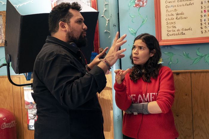 Marvin Lemus and America Ferrera on Gentefied’s set.