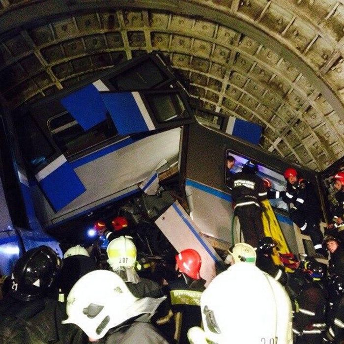 15 Jul 2014, Russia --- ITAR-TASS: MOSCOW, RUSSIA. JULY 15, 2014. At the site of a crash on the Moscow metro. Several cars derailed 200 meters away from Slavyansky Bulvar Metro Station. (Photo ITAR-TASS/ picture taken with a mobile phone/ Varya Valovil) --- Image by ? Valovil Varya/ITAR-TASS Photo/Corbis