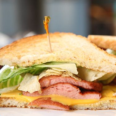 White bread, fried bologna, mustard chips