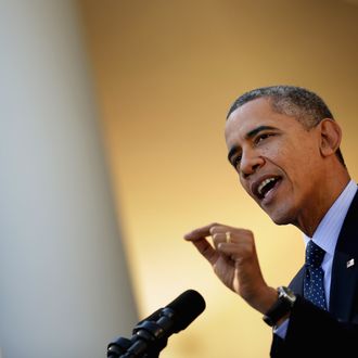 WASHINGTON, DC - OCTOBER 21: U.S. President Barack Obama delivers remarks about the error-plagued launch of the Affordable Care Act's online enrollment website in the Rose Garden of the White House October 21, 2013 in Washington, DC. According to the White House, the president was joined by 'consumers, small business owners, and pharmacists who have either benefitted from the health care law already or are helping consumers learn about what the law means for them and how they can get covered. 'Despite the new health care law's website problems, Obama urged Americans not to be deterred from registering for Obamacare because of the technological problems that have plagued its rollout. (Photo by Chip Somodevilla/Getty Images)