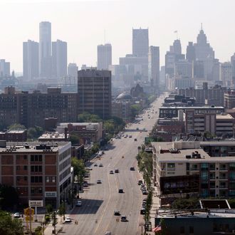 Buildings stand in the skyline of Detroit, Michigan, U.S., on Friday, July 19, 2013. Detroit, the cradle of the automobile assembly line and a symbol of industrial might, filed the biggest U.S. municipal bankruptcy after decades of decline left it too poor to pay billions of dollars owed bondholders, retired cops and current city workers.