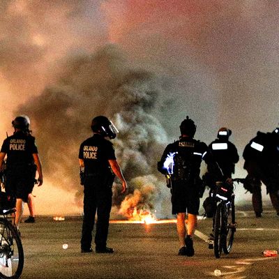 Police deploying tear gas amid Black Lives Matter protests in Los Angeles.