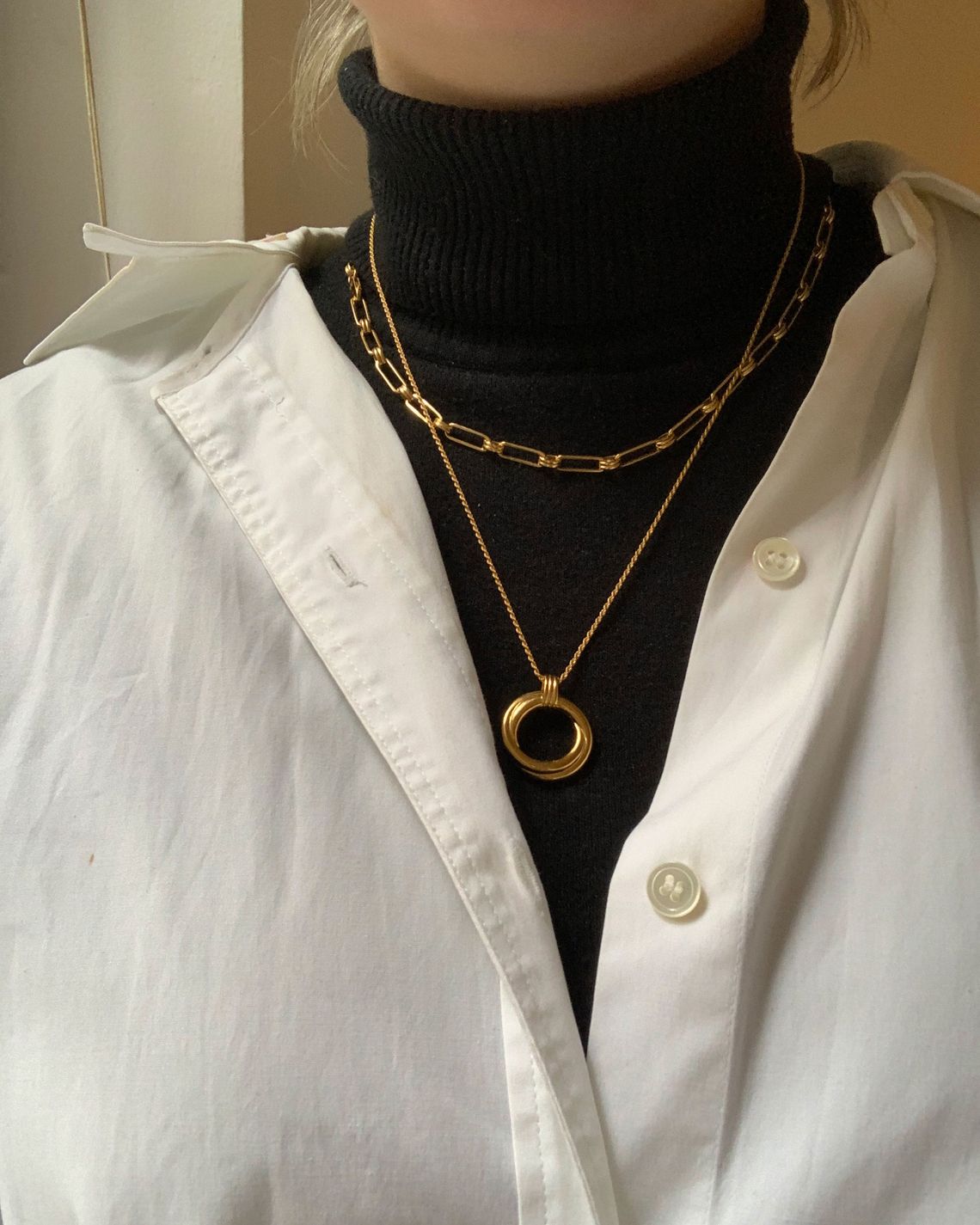 How To Pull Off Wearing Necklaces With Turtlenecks, According To A Stylist  | HuffPost Life
