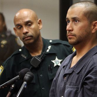 George Zimmerman (R) appears for a bond hearing at the John E. Polk Correctional Facility April 12, 2012 in Sanford, Florida.