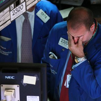 A trader works on the floor of the New York Stock Exchange during late day trading on June 29, 2010 in New York City. 