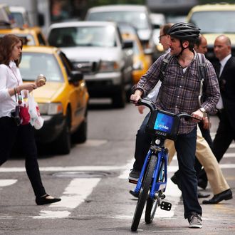 A man rides a Citi Bike on May 29, 2013 in New York City. Citi Bike, the long awaited bike sharing program that launched over the Memorial Day weekend in New York, provides 6,000 bikes which are available for short-term rental at 330 stations in Manhattan below 59th Street and parts of Brooklyn. Until June 2nd only members of the Citi Bike program can use the bikes. The bikes will rent daily for $9.95 (plus tax ) or weekly for $25 and will be limited to trips of 30 minutes each. More than 16,000 people have signed up to be members so far.