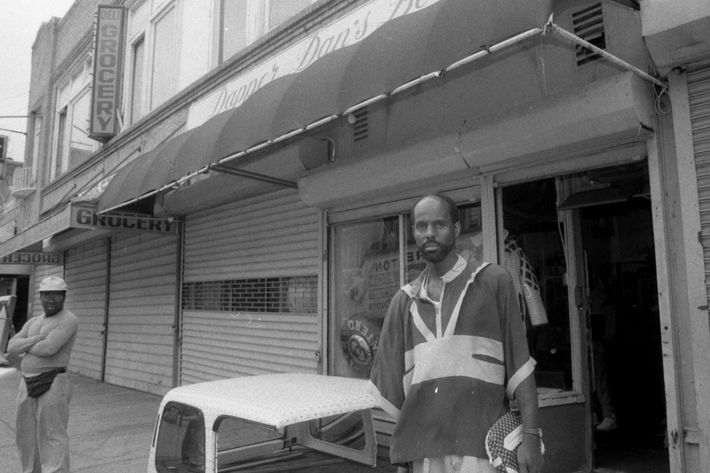 Dapper Dan, pictured here at his boutique in 1989