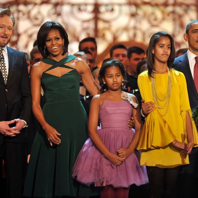 The Obamas with the event's host, Conan O'Brien.