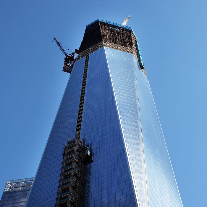 NEW YORK, NY - JANUARY 30: One World Trade Center, the central skyscraper at Ground Zero, stands under construction on January 30, 2012 in New York City. The price tag for One World Trade has recently been valued at $3.8 billion, which would make it the world's most expensive new office tower. Most of the cost overruns are due to the security measures being taken in the design of the building which sits on a site that has been bombed twice by terrorists. To offset the costs of One World Trade Center, which is being built by the Port Authority of New York and New Jersey, higher bridge and tunnel tolls have been instated and there has been a reduction in spending on transportation infrastructure. The 1,776-foot skyscraper is expected to be completed at the end of 2013. (Photo by Spencer Platt/Getty Images)
