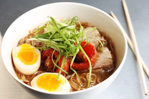 Ivan Ramen's classic shio, with rye noodles, roasted tomato, and pork chashu.