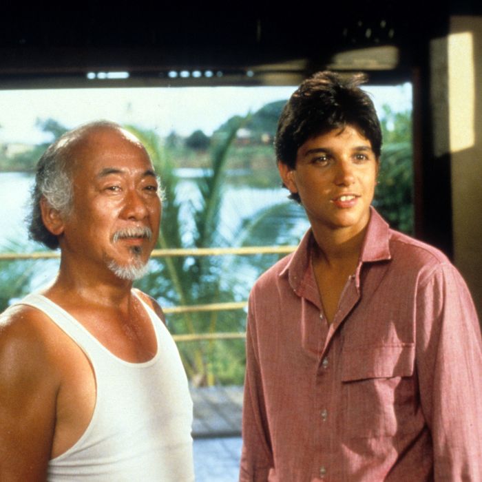 Pat Morita and Ralph Macchio in a scene from the film 'The Karate Kid', 1984. (Photo by Columbia Pictures/Getty Images)