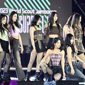 Girl group Fromis_9 performing on stage