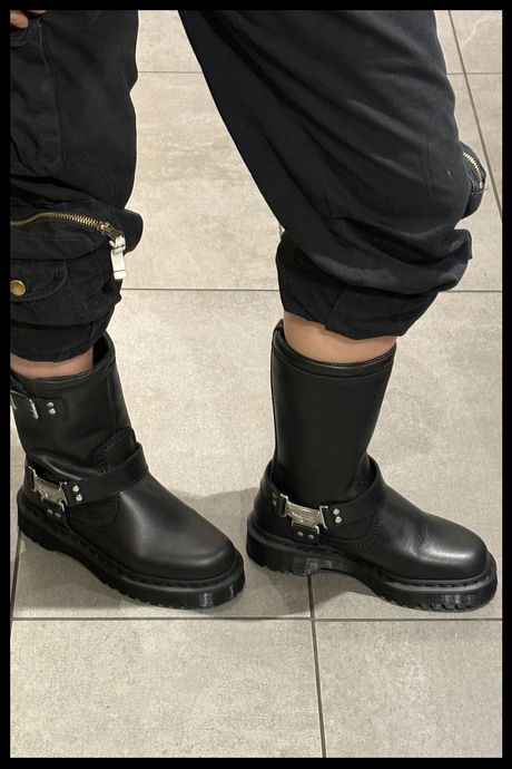 The author wearing Dr. Martens Anistone boots.