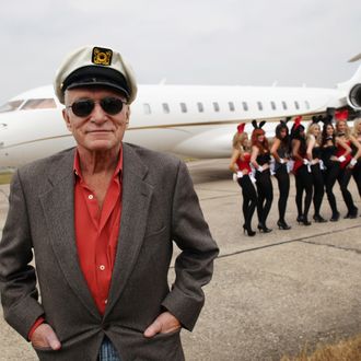 STANSTED, ENGLAND - JUNE 02: Playboy founder Hugh Hefner arrives at Stansted Airport on June 2, 2011 in Stansted, England. Mr Hefner is back in the UK to mark the launch of the new Playboy Club in Mayfair, which opens on June 4. The club's opening will welcome back the iconic Playboy Bunny to London after a 30 year absence. Famous Bunnies have included Debbie Harry and Lauren Hutton. (Photo by Dan Kitwood/Getty Images)