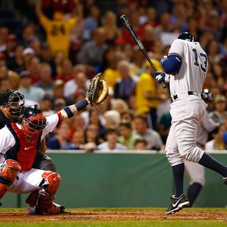 BOSTON, MA - AUGUST 18: Alex Rodriguez #13 of the New York Yankees is hit by a pitch in the second inning by Ryan Dempster #46 of the Boston Red Sox during the game on August 18, 2013 at Fenway Park in Boston, Massachusetts. Both benches were immediately warned and manager Joe Girardi #28 of the New York Yankees was ejected by umpire Brian O'Mora. (Photo by Jared Wickerham/Getty Images)