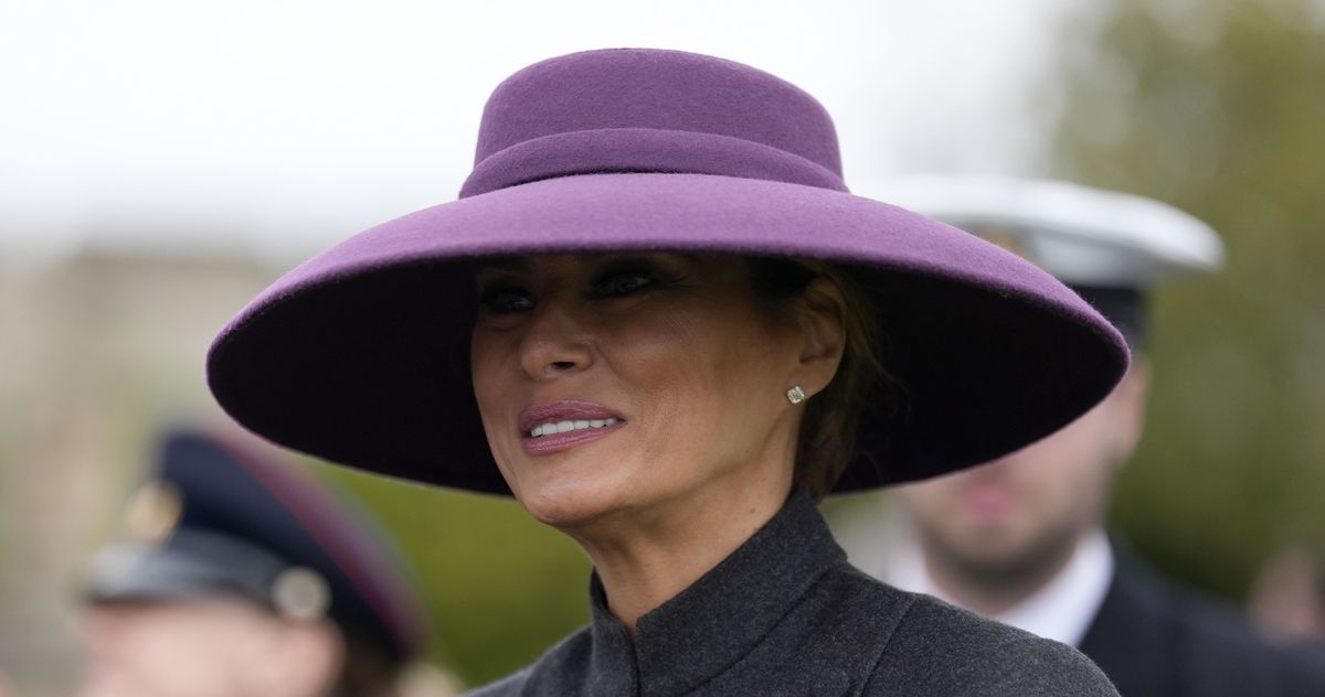melania purple dress Melania Trump Found a New Fashion Disguise for Her UK Visit