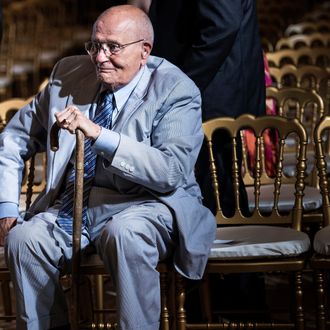 Representative John Dingell (D-MI) sits after listening to US President Barack Obama make a statement in the East Room of the White House July 18, 2013 in Washington, DC. 