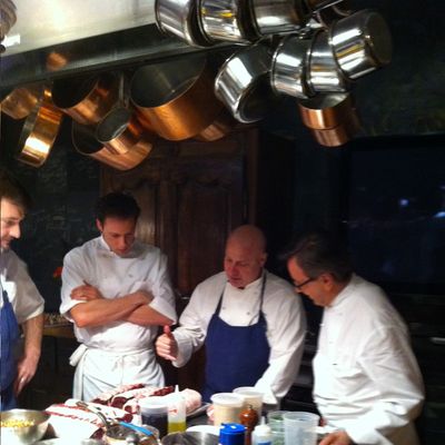 Colicchio cooking alongside foodie-Olympian Garrett Weber-Gale and Daniel Boulud.