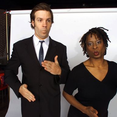 A sideburned Sudeikis does the Robot alongside Holly Walker in Second City's Las Vegas revue The Not Ready for $3.99 Prime Rib Players in 2003.