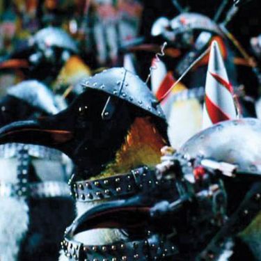 The studded dog collar: practical, in the event of a battle, but also alluring, with a hint of medieval-S&M. The Penguin Army could also double as Beyoncé's backup dancers in a pinch.