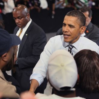 U.S. President Barack Obama greets workers following a speech at the Master Lock factory on February 15, 2012 in Milwaukee, Wisconsin. Obama applauded the company, which he cited in his State of the Union address, for bringing back 100 jobs to the U.S. from China.