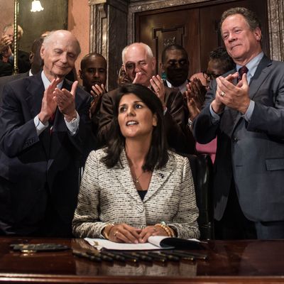 South Carolina Gov. Nikki Haley receives applause after signing a bill to remove the Confederate battle flag from the state house grounds July 9, 2015 in Columbia, South Carolina.