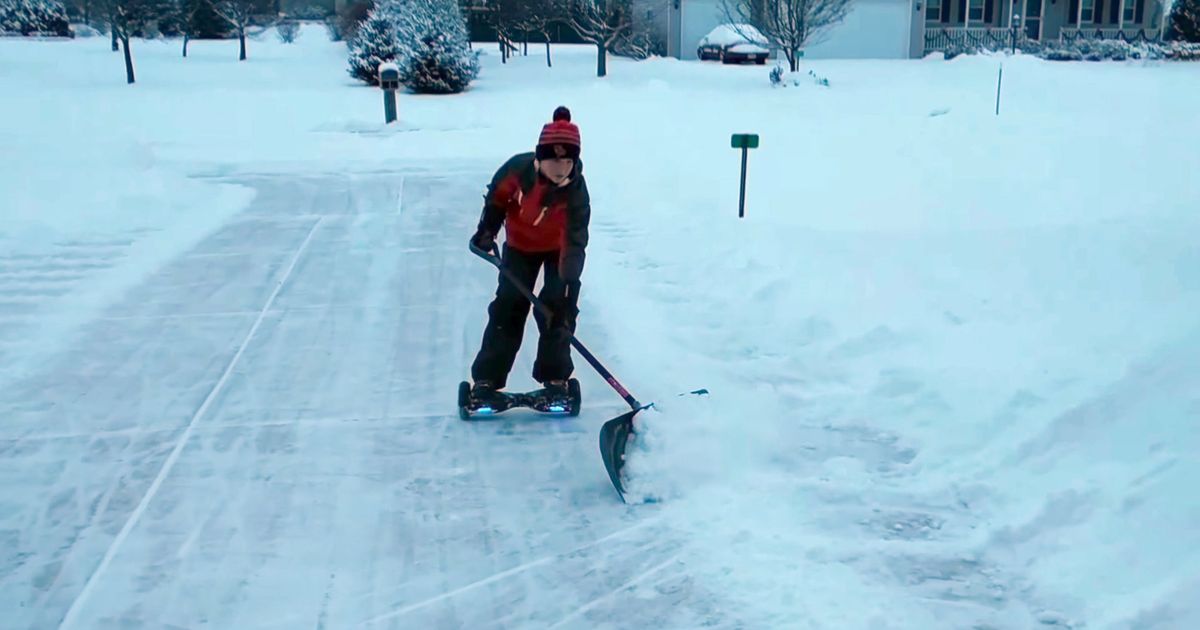 The Fastest Way to Shovel Your Driveway Is on a Hoverboard