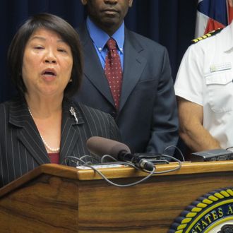 U.S. Attorney Florence Nakakuni speaks at a news conference in Honolulu on Monday, March 18, 2013 to announce authorities have charged a U.S. Pacific Command defense contractor with giving defense secrets to a Chinese woman he was romantically involved with. Benjamin Pierce Bishop, 59, allegedly sent the 27-year-old woman an email last May with information on existing war plans, nuclear weapons and U.S. relations with international partners, according to a criminal complaint filed in U.S. District Court in Honolulu. (AP Photo/Audrey McAvoy)