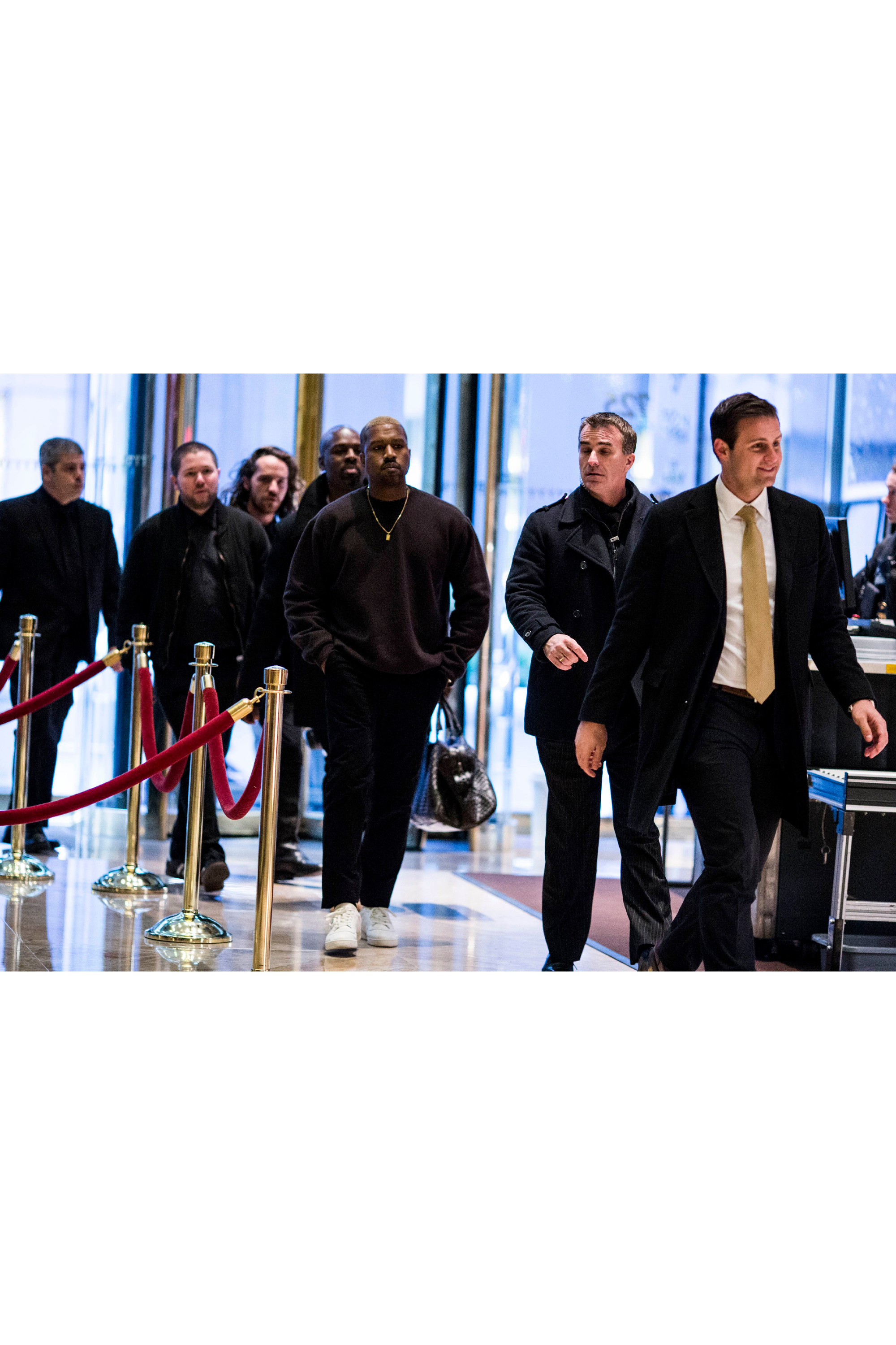 Kanye West shows up during the transition, December 2016.