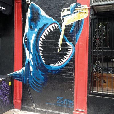 A mural outside Spring Lounge in Nolita, one of the city's best dive bars.