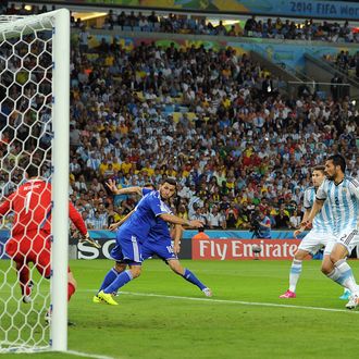 RIO DE JANEIRO, BRAZIL - JUNE 15: Sead Kolasinac of Bosnia-Herzegovina scores a goal during the 2014 FIFA World Cup Brazil Group F match between Argentina and Bosnia-Herzegovina at Maracana Stadium on June 15, 2014 in Rio de Janeiro, Brazil. (Photo by Chris Brunskill Ltd/Getty Images)