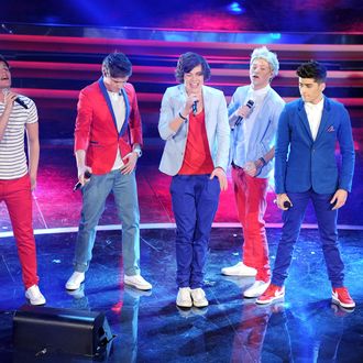 One Direction performs on stage at the fourth day of the 62th Sanremo Song Festival