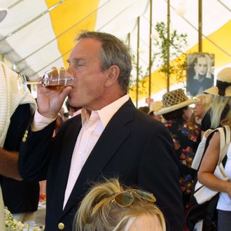 Michael Bloomberg drinks wine.