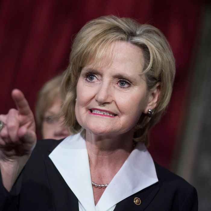 Senator Cindy Hyde-Smith, Republican Senator from Mississippi, attends her swearing-in ceremony the Capitol's Old Senate Chamber after being sworn in on the Senate floor on April 9, 2018.