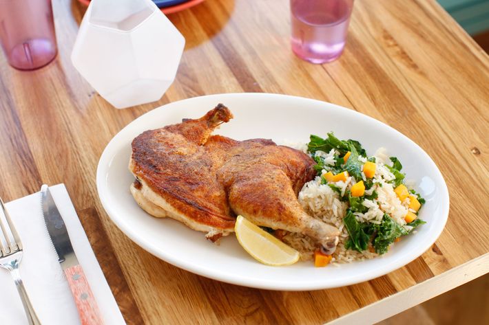 Crispy pressed chicken with kale pan rice and ginger-scallion sauce.